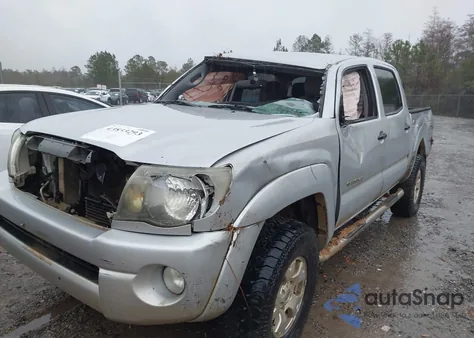 2009 Toyota Tacoma Base V6 z USA, uszkodzony, nr VIN 3TMLU42N09M027114
